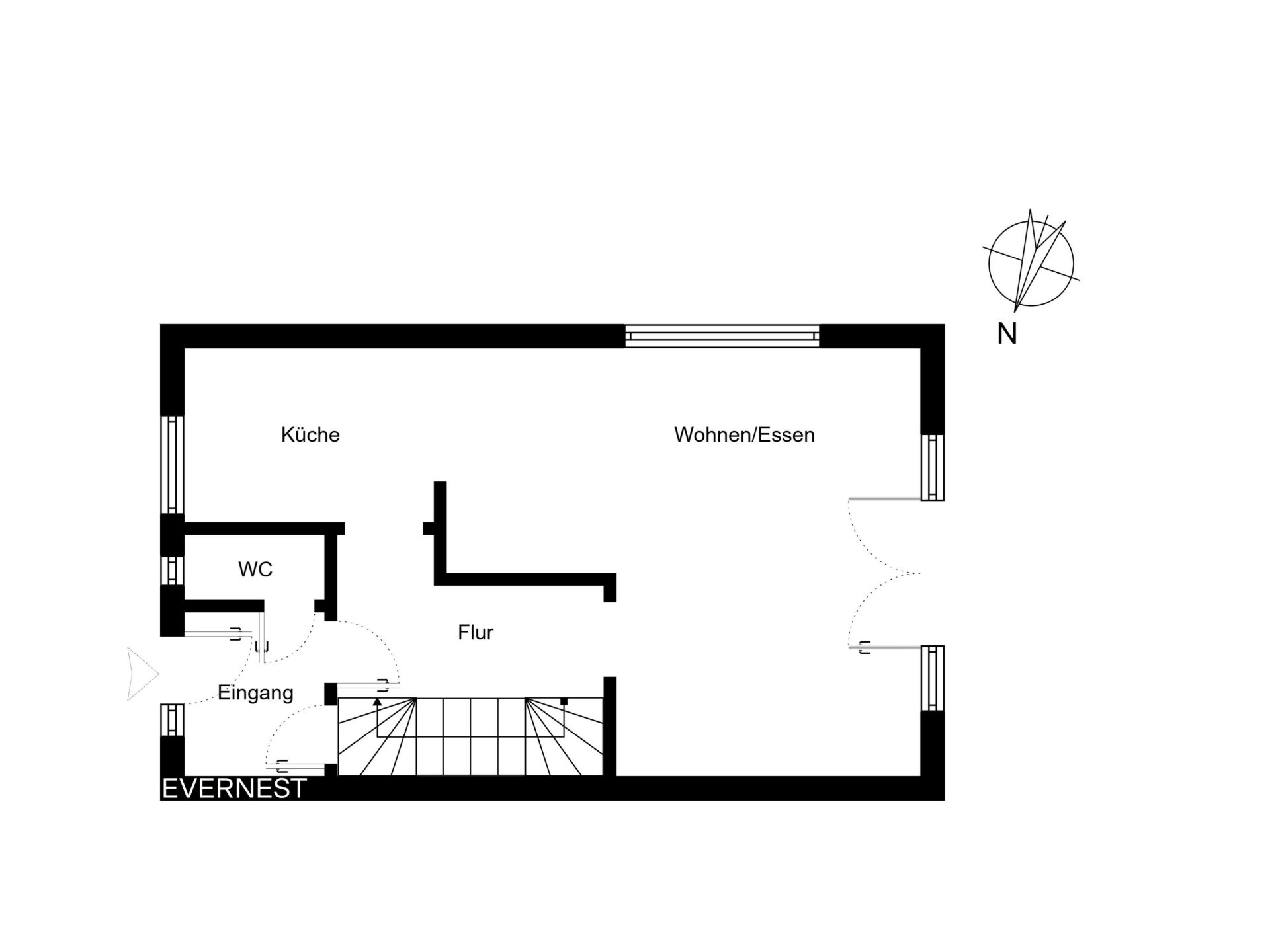 Grundriss mit Küche, WC, Flur, Eingang und Wohn-/Essbereich, sowie Treppe.