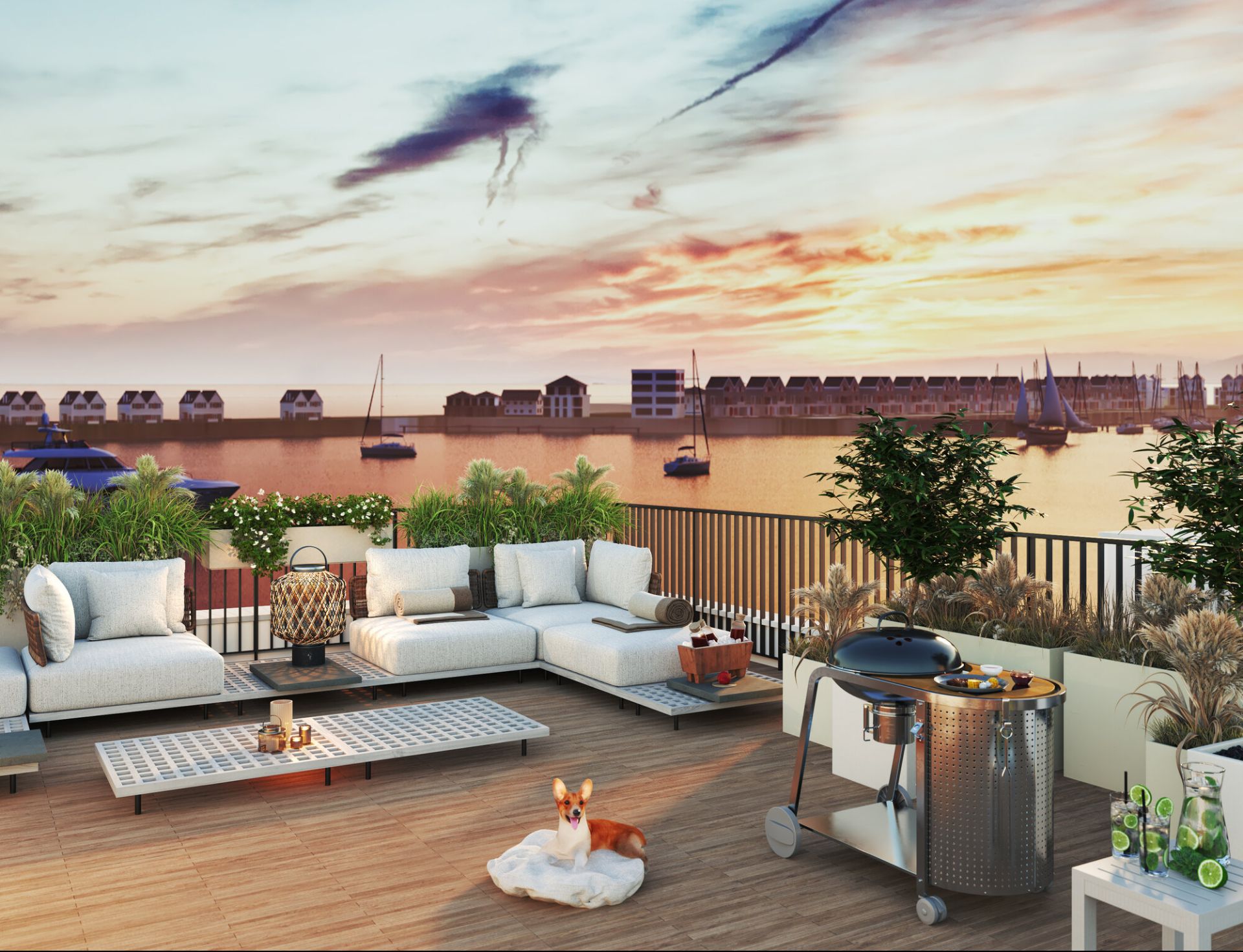Moderne Terrasse mit Sofas, Grill und Hund, Blick auf Wasser und Segelboote bei Sonnenuntergang.