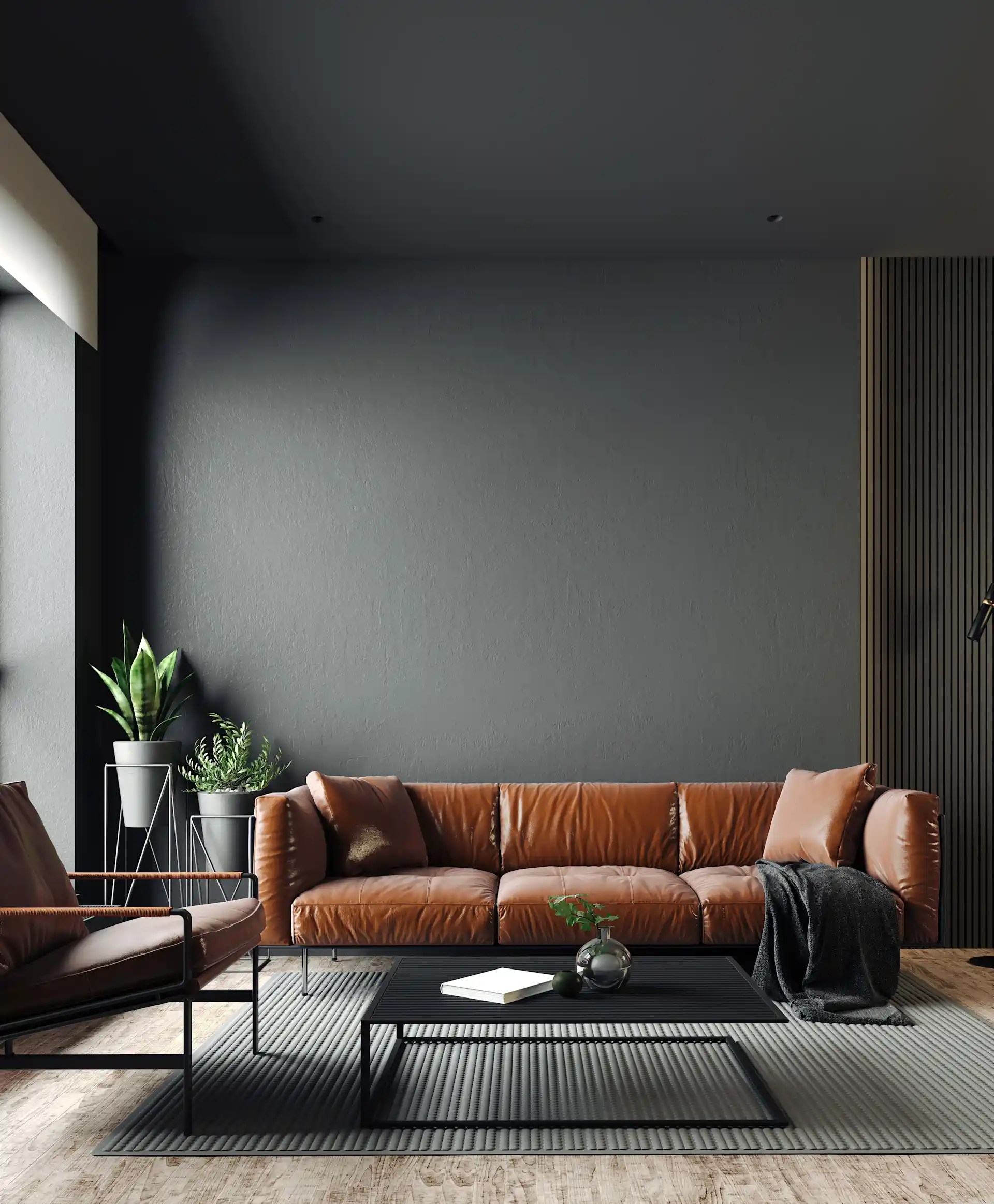Modernes Wohnzimmer mit braunem Ledersofa, Couchtisch und Zimmerpflanzen.