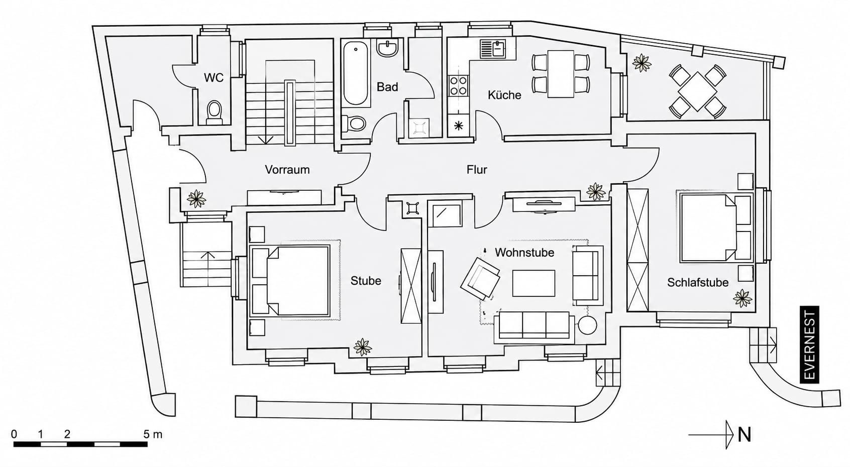 Grundriss einer Wohnung mit Schlafzimmer, Wohnzimmer, Küche, Bad, WC und Flur.