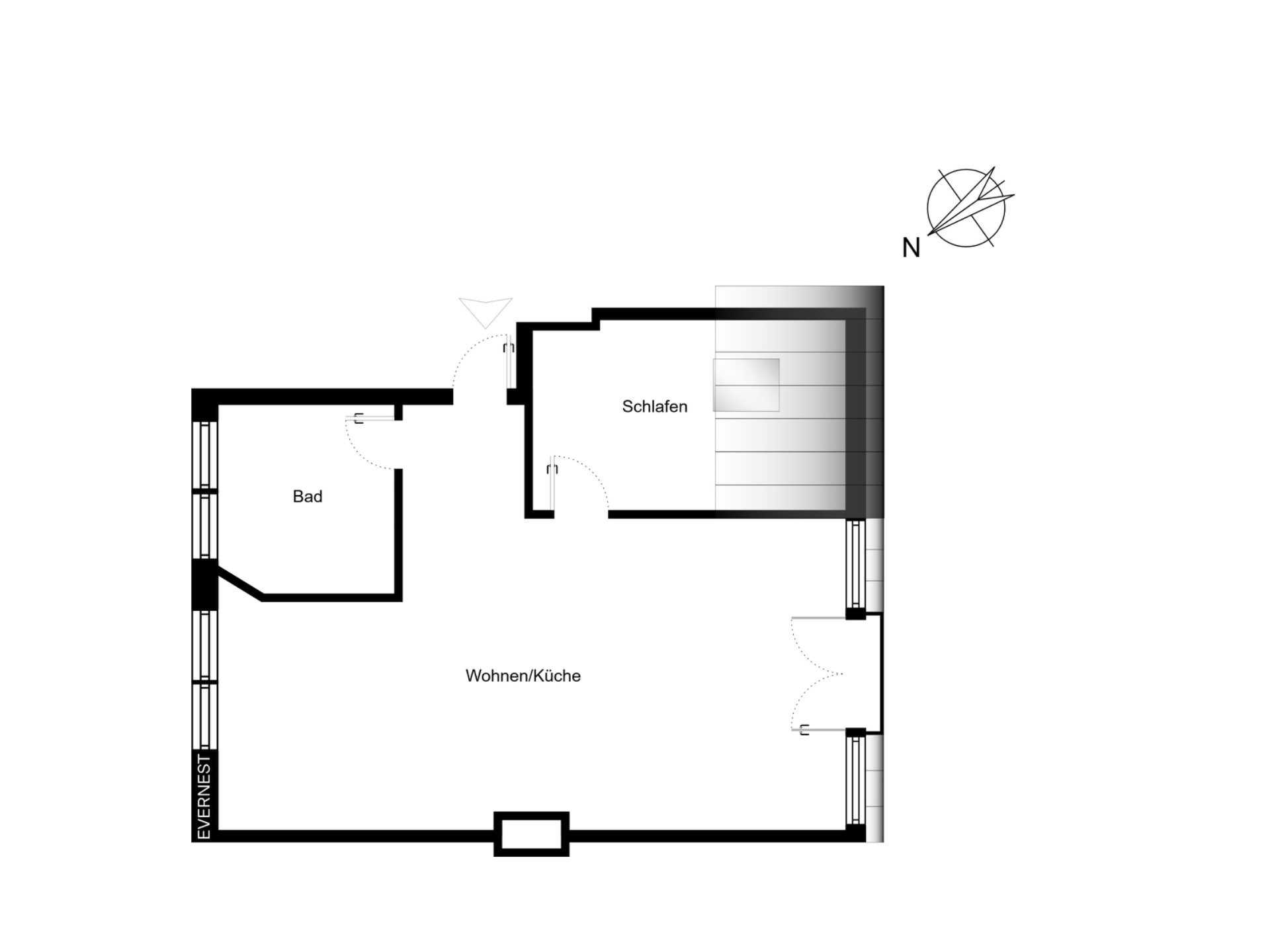 Grundriss einer Wohnung mit Bad, Schlafzimmer und Wohnküche.