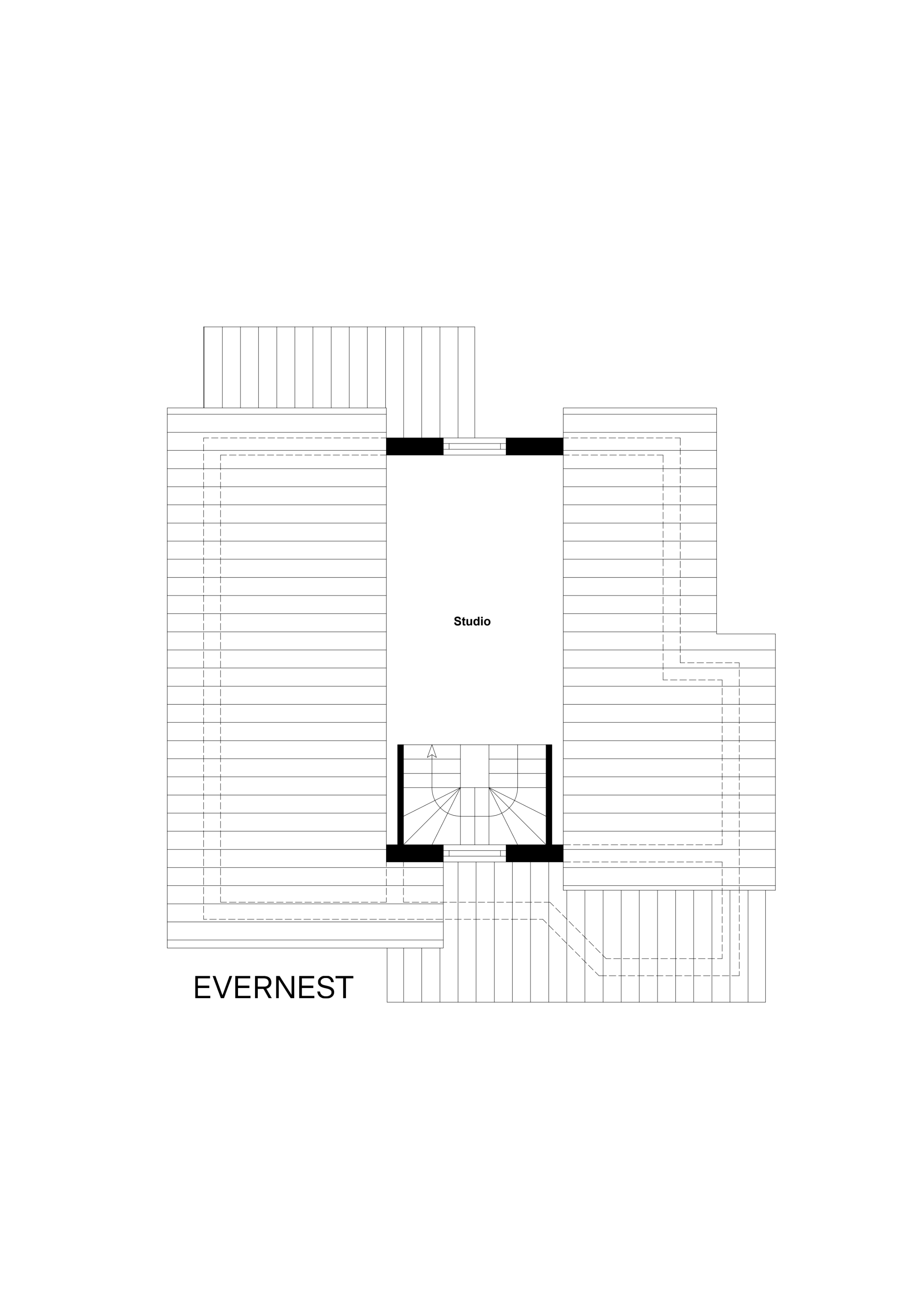 Grundriss mit einem Raum namens Studio und einer Treppe in der Mitte.