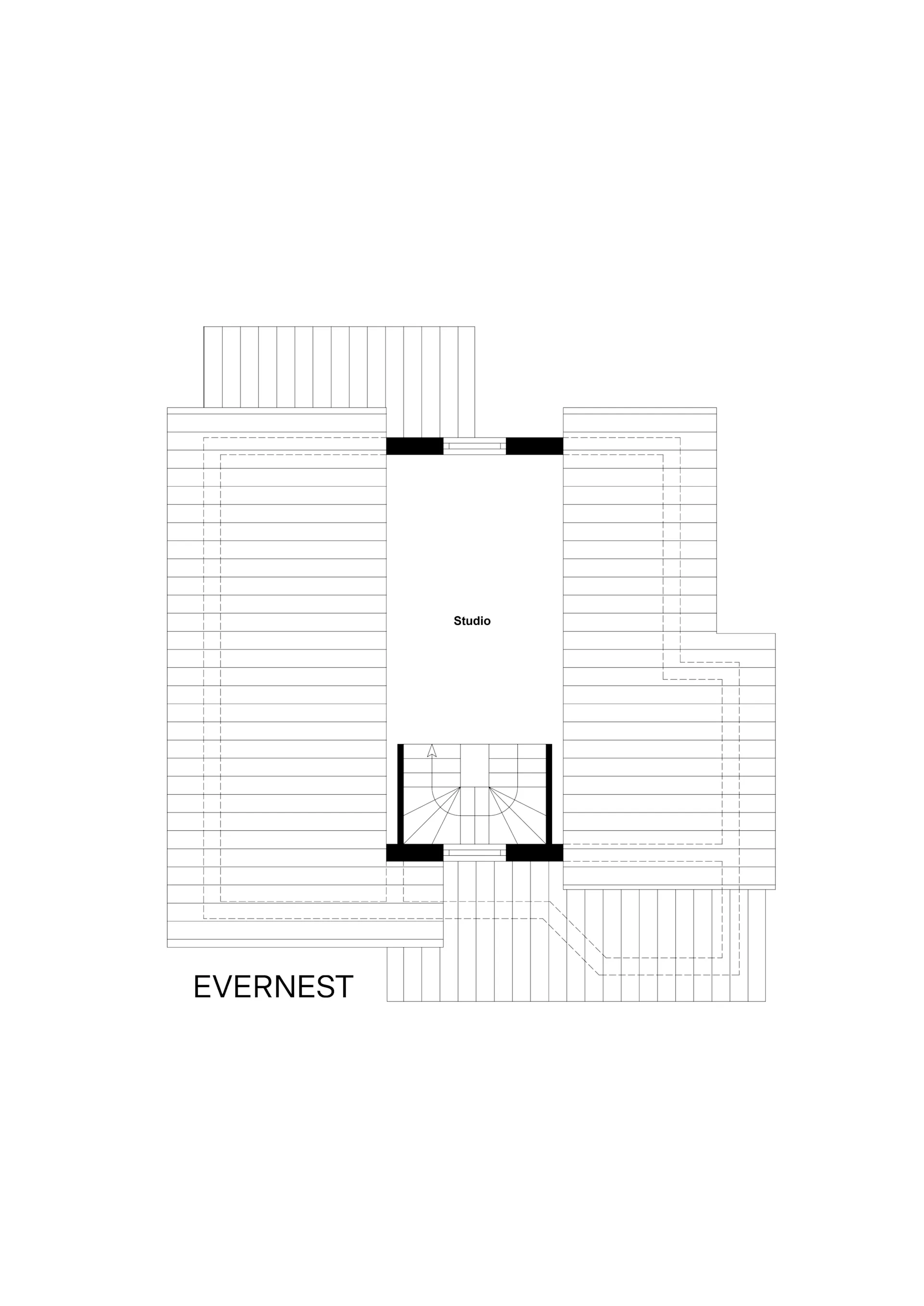 Grundriss mit einem Raum namens Studio und einer Treppe in der Mitte.