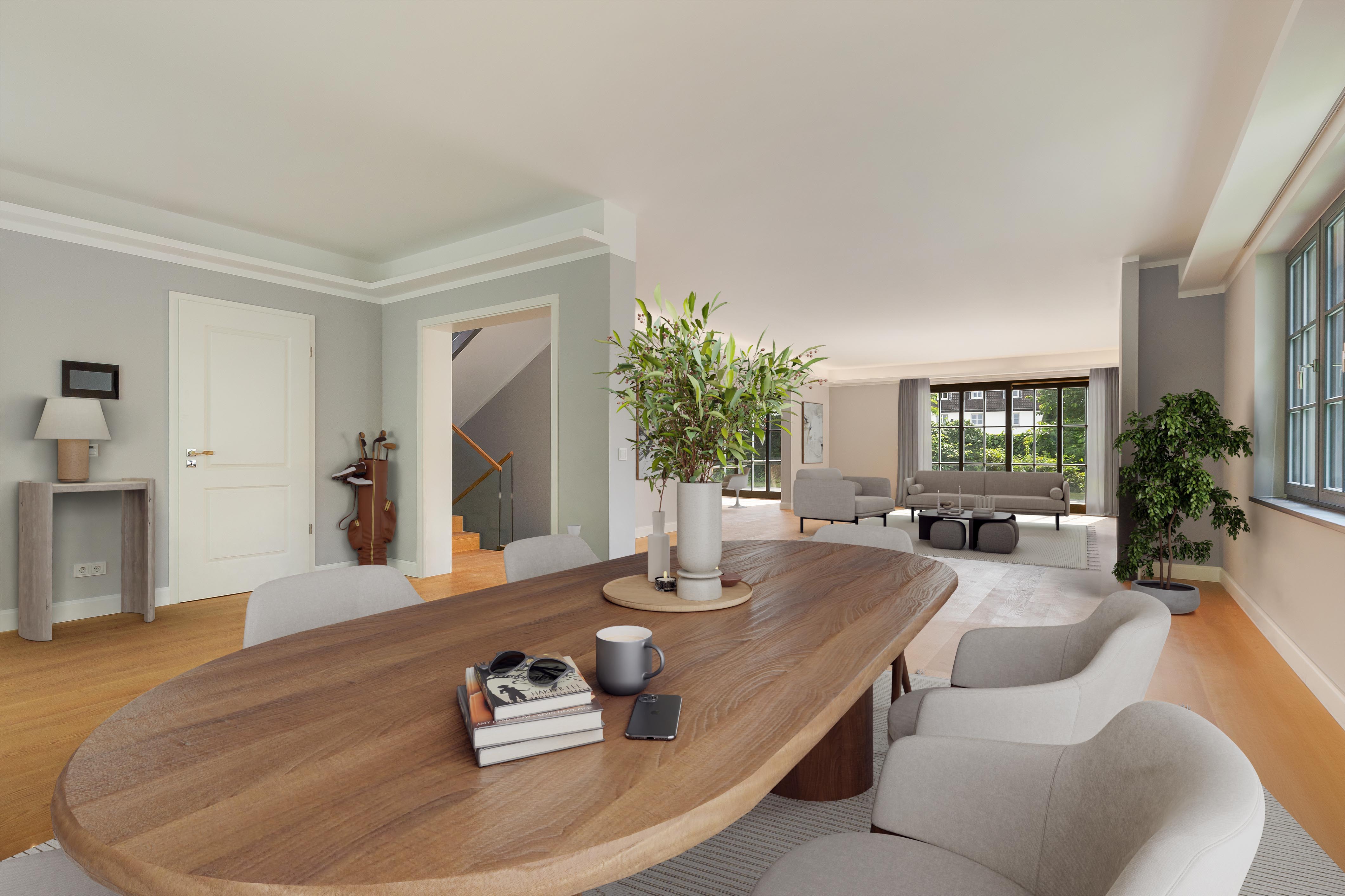 Großes, helles Wohnzimmer mit Esstisch, Stühlen, Sofas, Pflanzen und großen Fenstern.