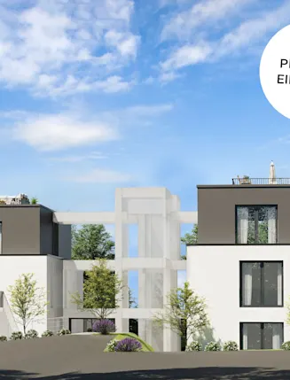 Moderne Wohngebäude mit Balkonen und Dachterrassen, umgeben von Bäumen unter blauem Himmel.