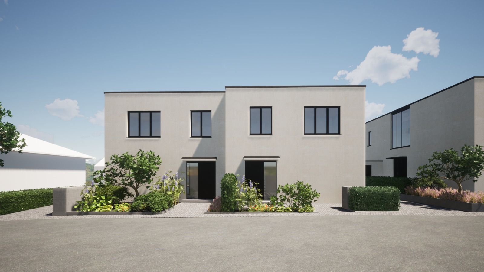 Modernes, zweistöckiges Wohnhaus mit Flachdach, großen Fenstern und Vorgarten mit Büschen.