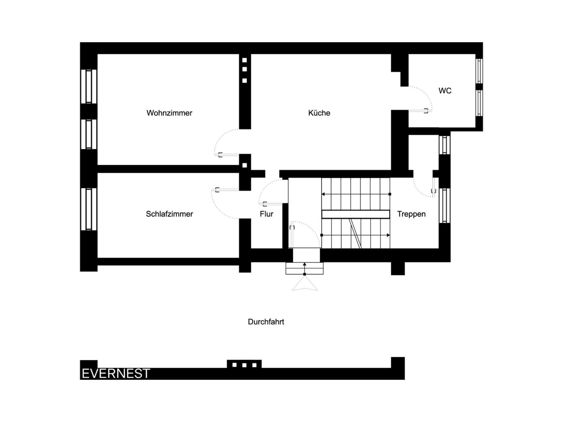 Grundriss mit Wohnzimmer, Schlafzimmer, Küche, WC, Flur und Treppenhaus.