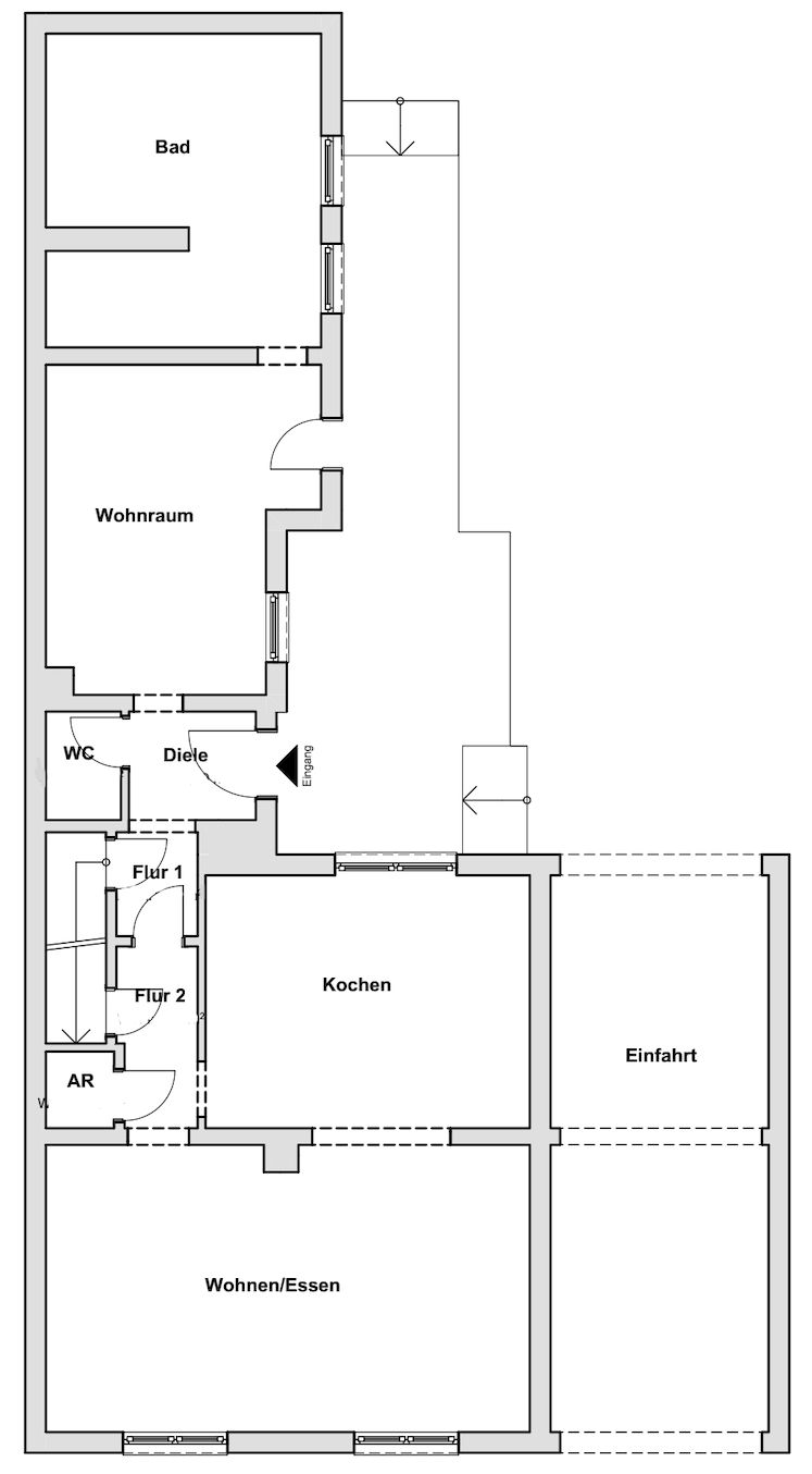 Grundriss eines Wohnhauses mit Räumen wie Bad, Wohnraum, Küche, WC und Abstellraum.