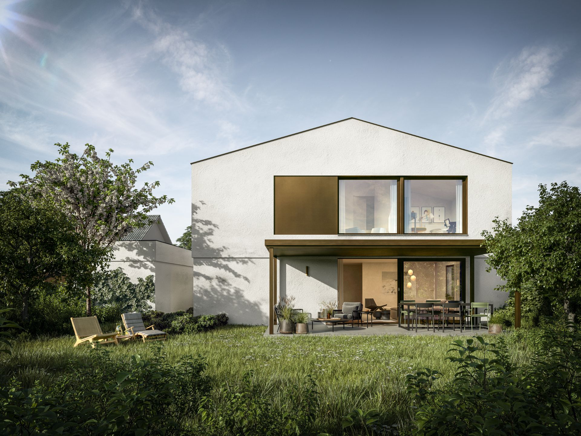 Modernes weißes Wohnhaus mit Terrasse und Gartenmöbeln, umgeben von grünem Garten.
