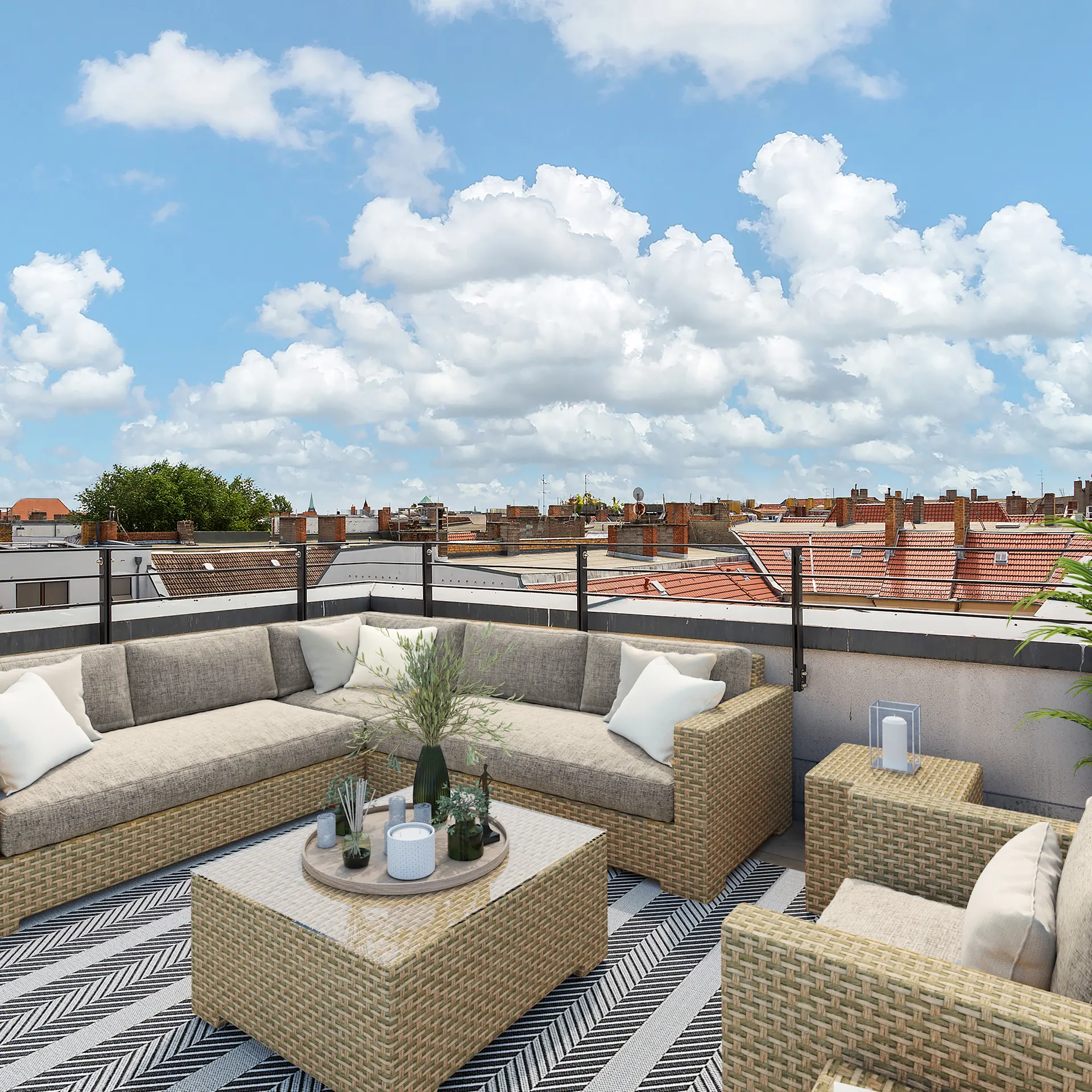 Moderne Dachterrasse mit Sitzgruppe, Teppich und Pflanzen, Ausblick auf Hausdächer.