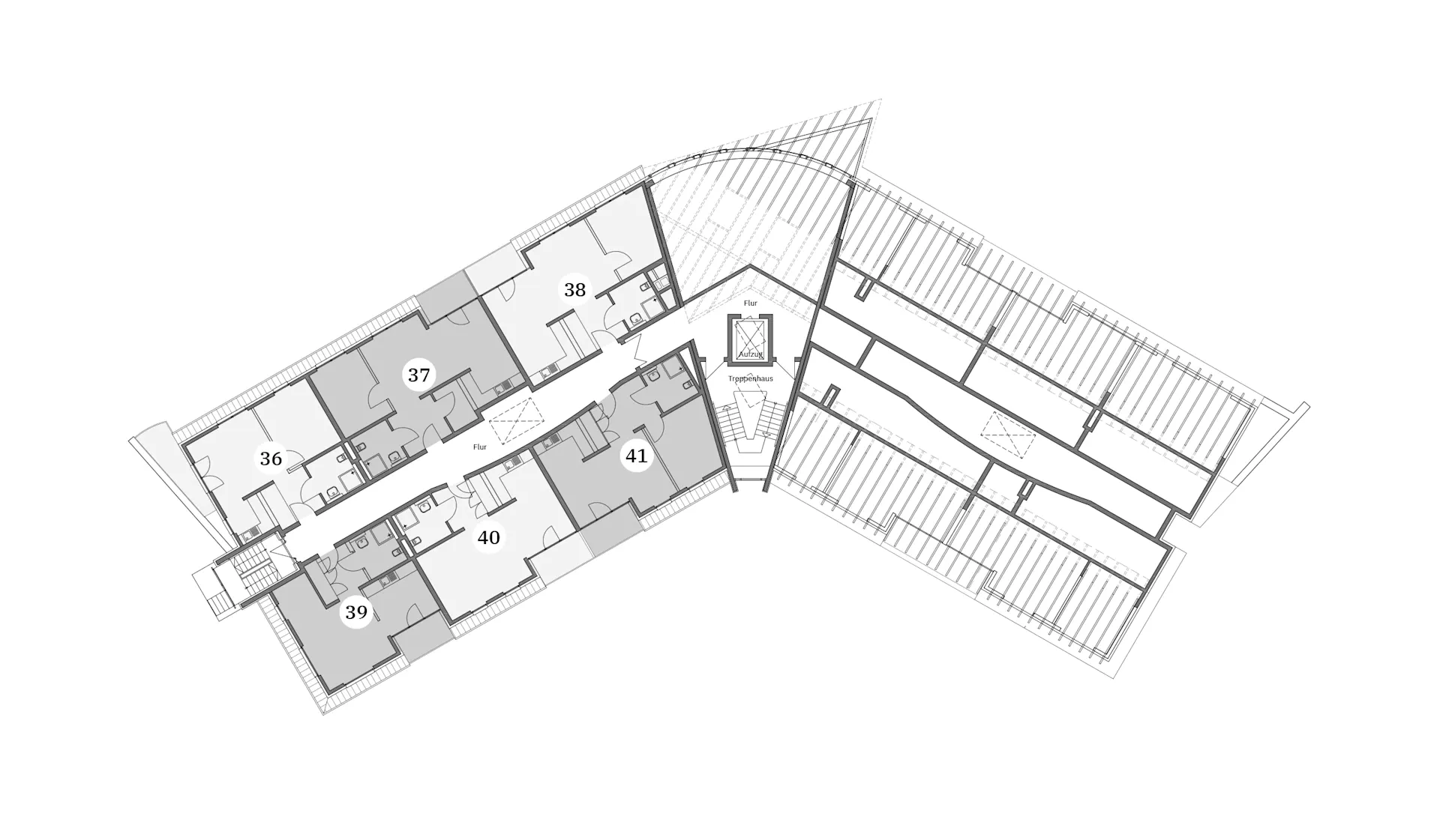 Grundriss eines Wohngebäudes mit mehreren Wohnungen, Fluren und Treppenhaus.