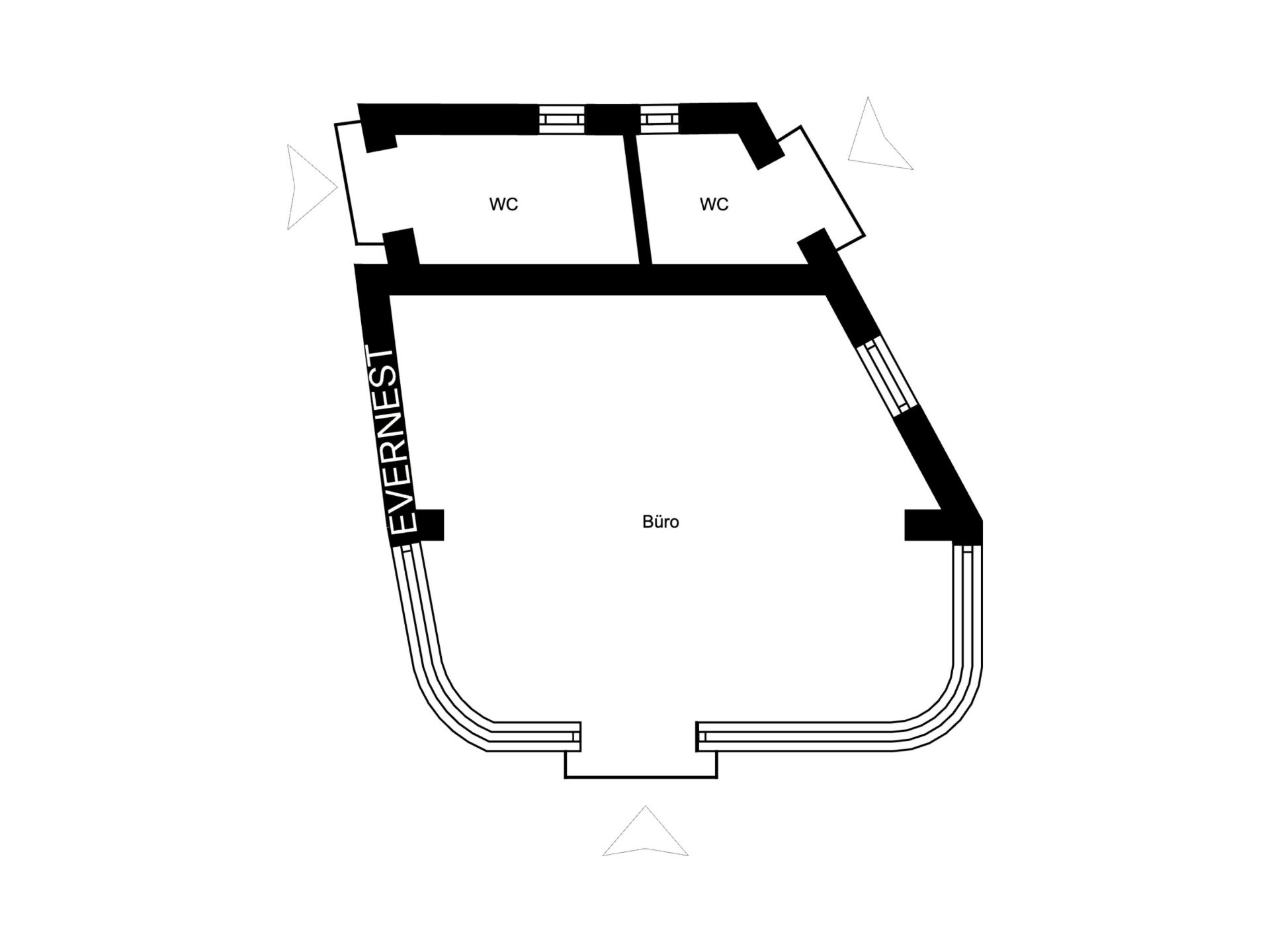 Grundriss mit großem Büroraum und zwei separaten WC-Räumen.