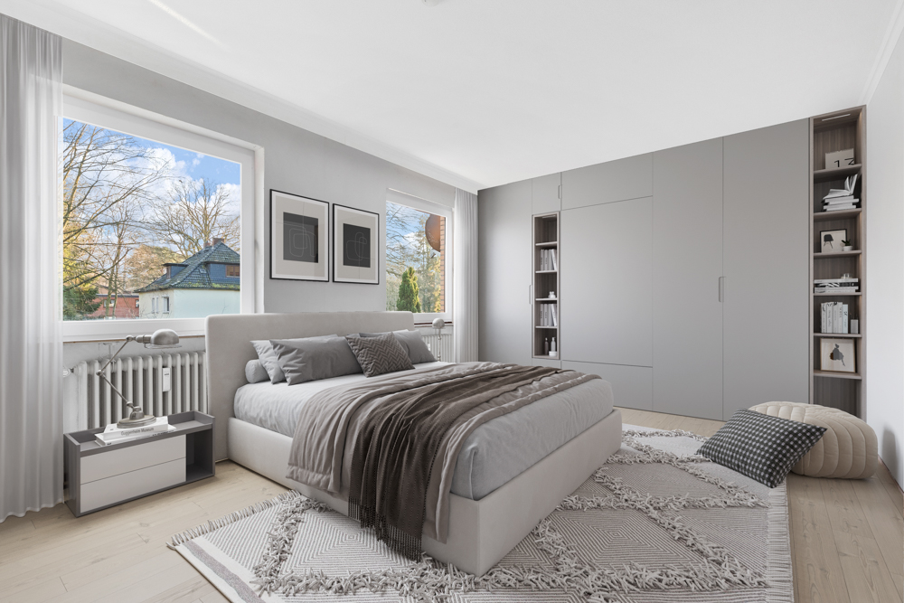 Modernes Schlafzimmer mit großem Bett, grauem Schrank und Fenstern mit Blick auf Bäume.