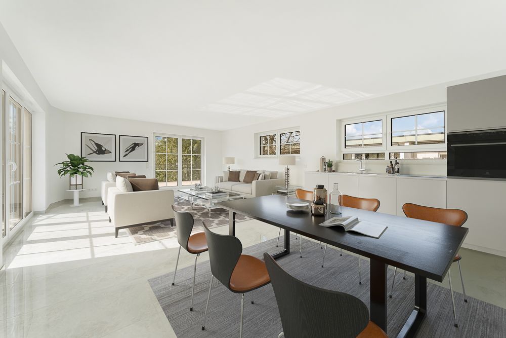 Helles Wohnzimmer mit Essbereich, großen Fenstern, zwei Sofas und moderner Einrichtung.