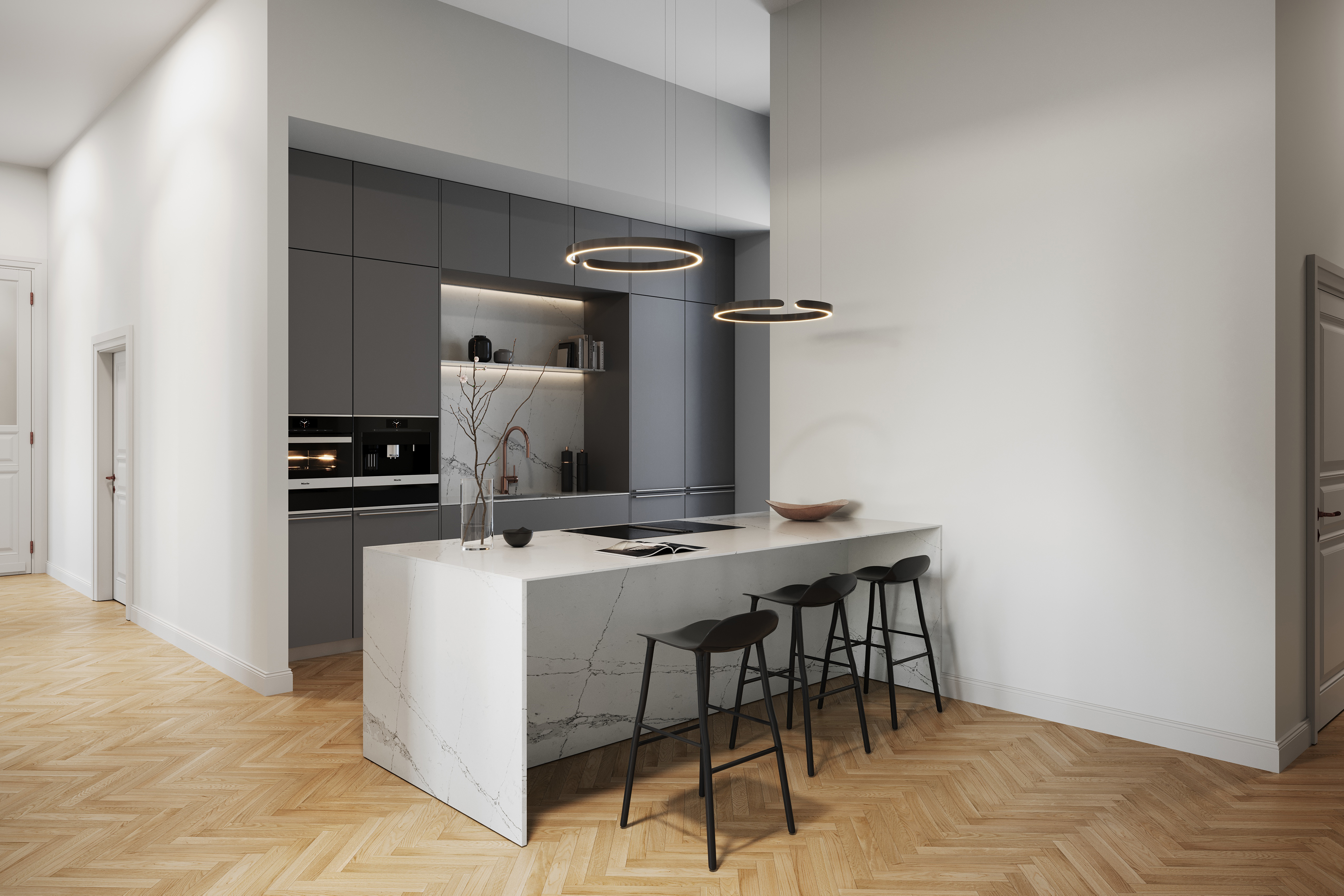 Moderne Küche mit grauen Schränken, Kücheninsel, drei Hockern und zwei runden Deckenlampen.