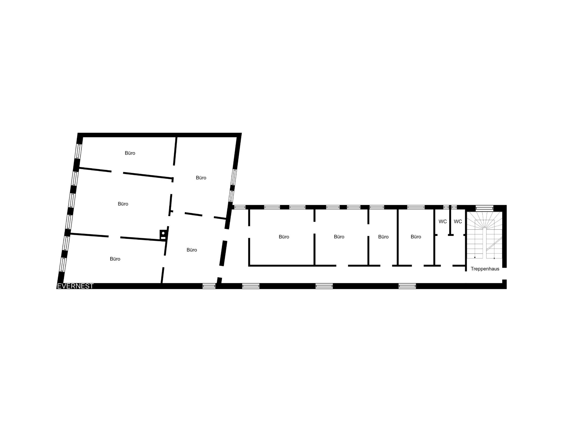 Grundriss mit mehreren Büroräumen, zwei WCs und einem Treppenhaus.