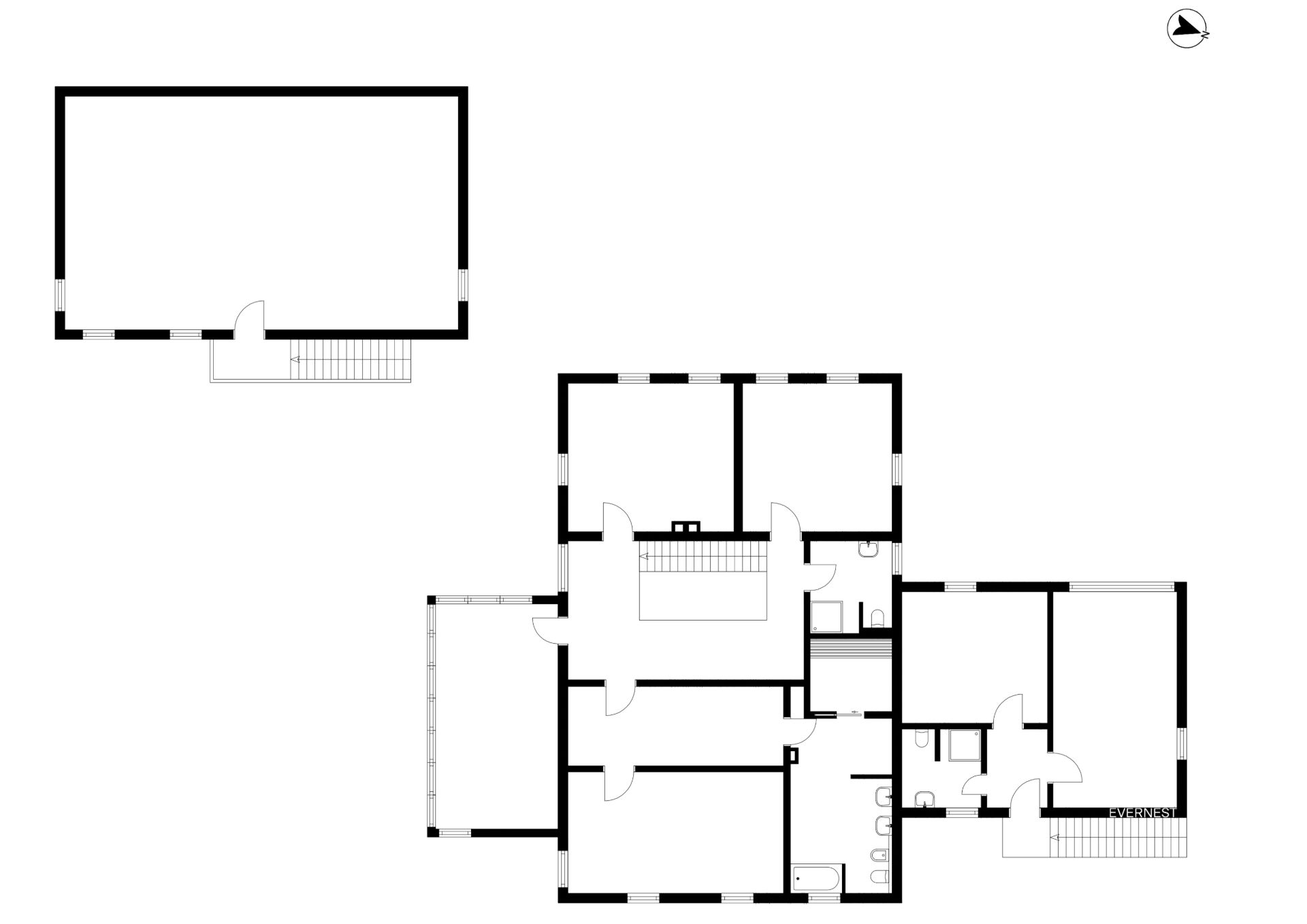 Grundriss eines Wohnhauses mit mehreren Zimmern und einem separaten Nebengebäude.