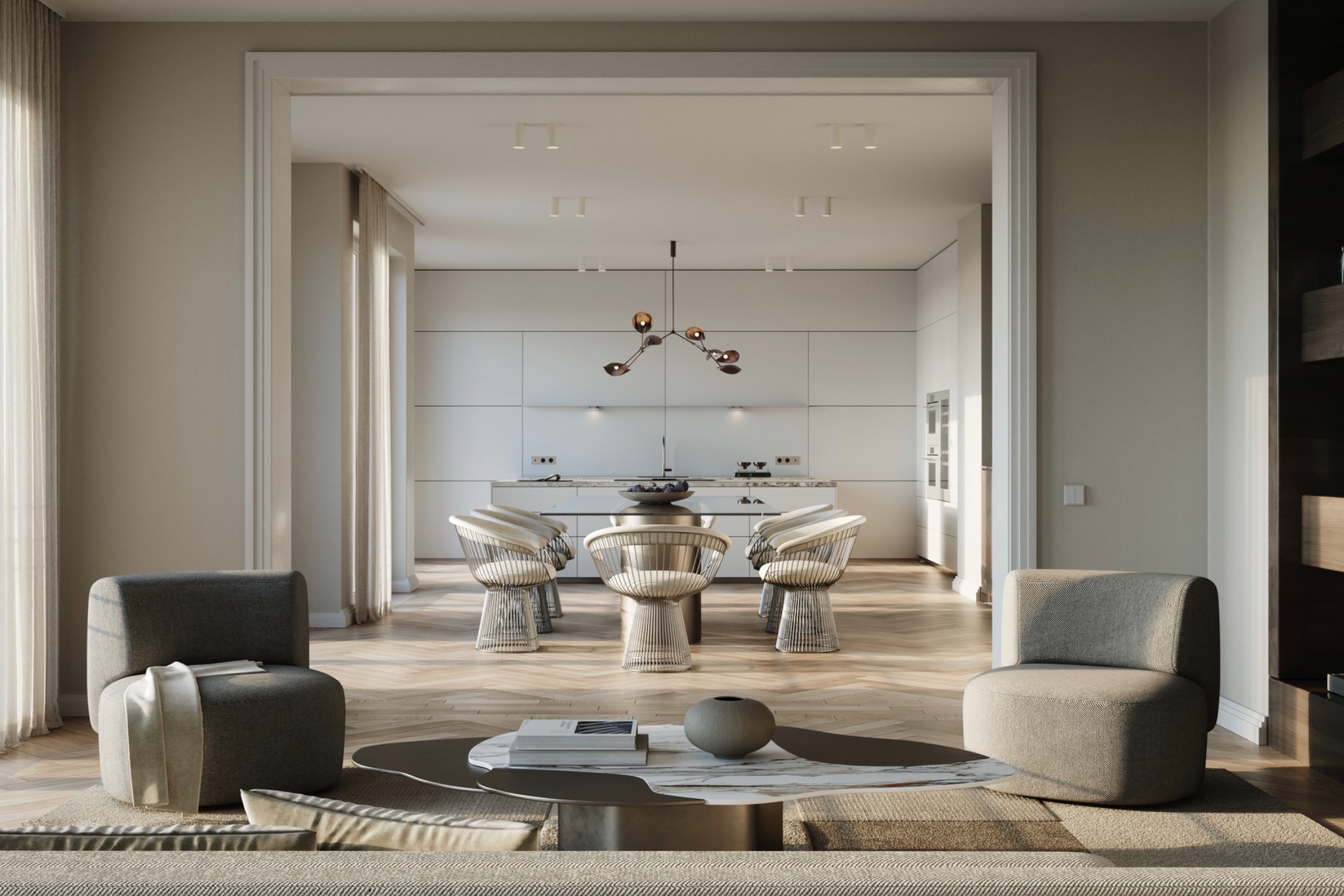 Modernes Wohnzimmer mit zwei Sesseln und Blick auf einen Esstisch mit sechs Stühlen in hellem Raum.