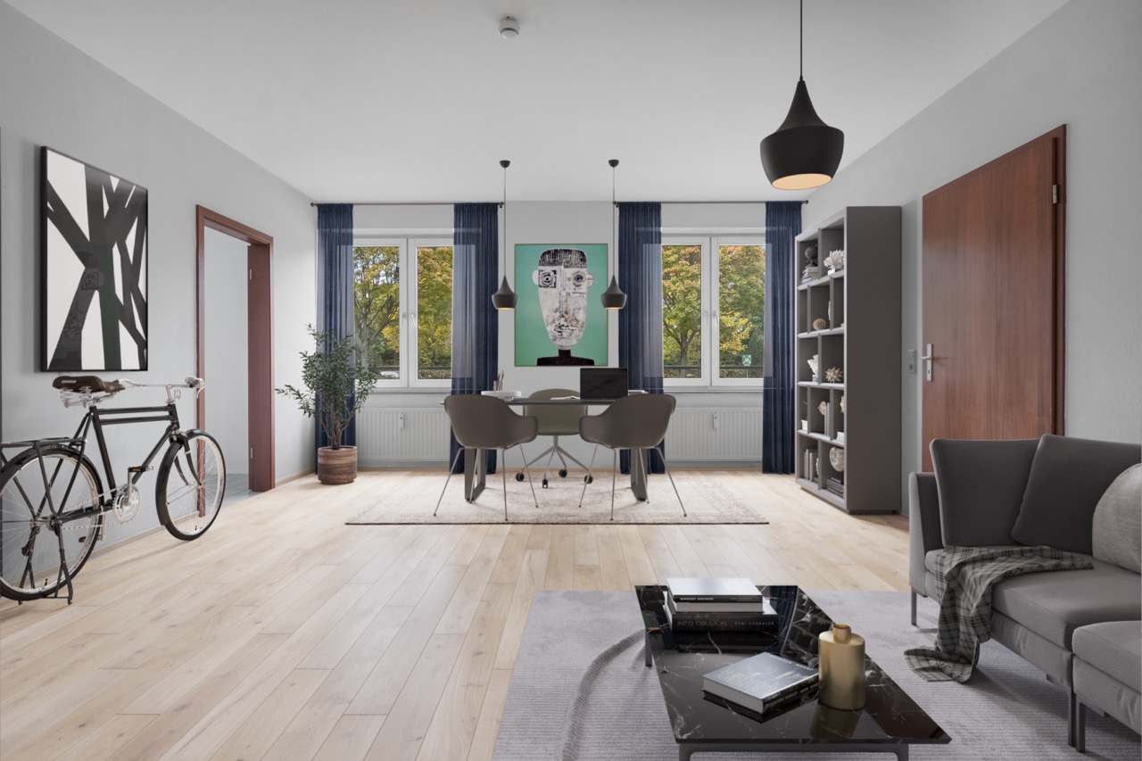 Modernes Wohnzimmer mit Sofa, Couchtisch, Schreibtisch, Bücherregal und Fahrrad auf hellem Holzboden.