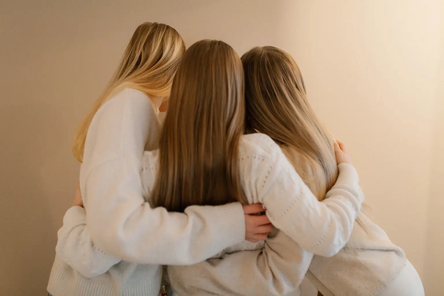 Three people together.