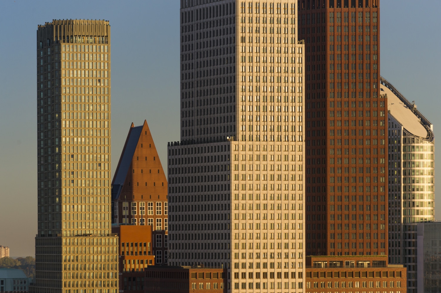 a group of tall buildings in a city