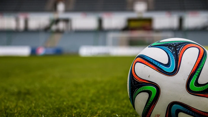 A close up of a football on a field