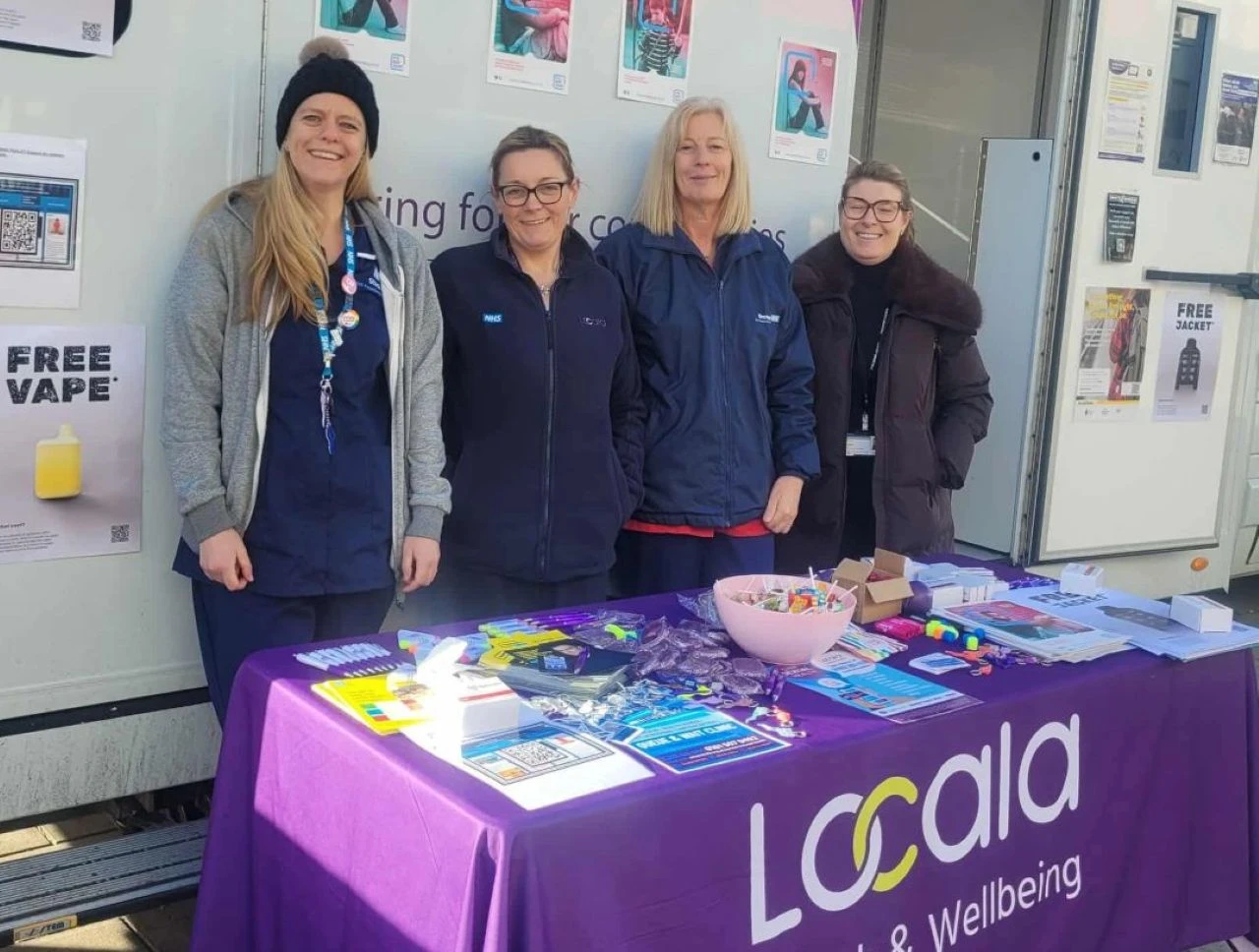 News - Locala staff pose for 16 Days of Activism