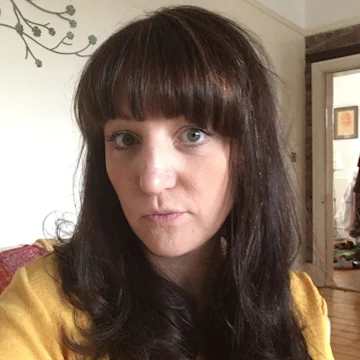 A woman looking at the camera