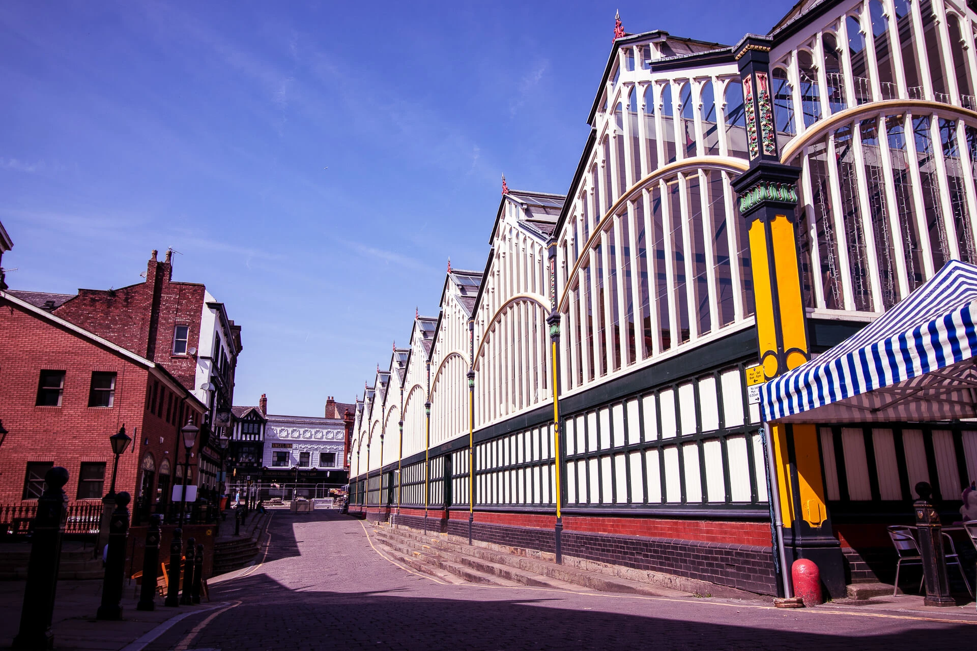 Side view of Stockport Market on a bright sunny day.