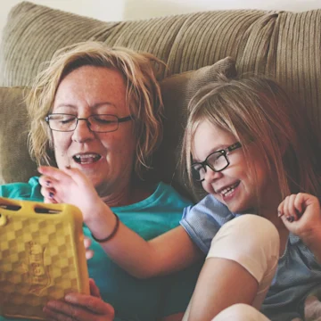 woman and child with tablet