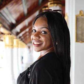 A women smiling at the camera