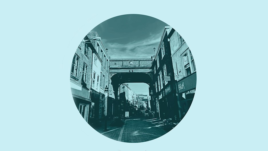 Little Underbank (a street in the Underbanks) tinted blue and cropped within a circle.