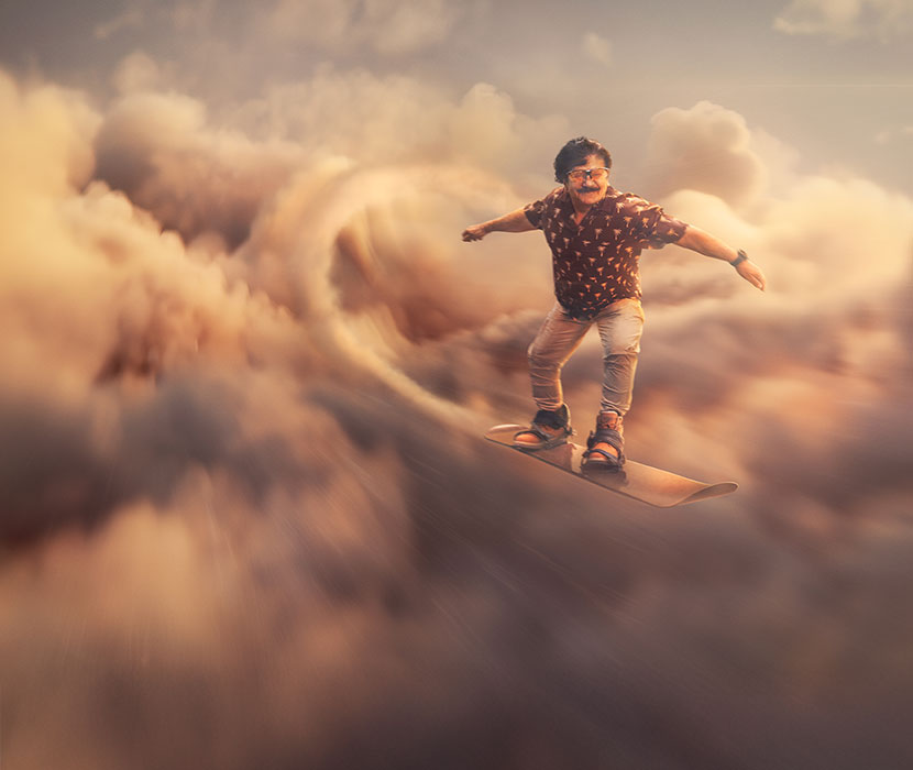 Karim surfar bland molnen på en skyboard