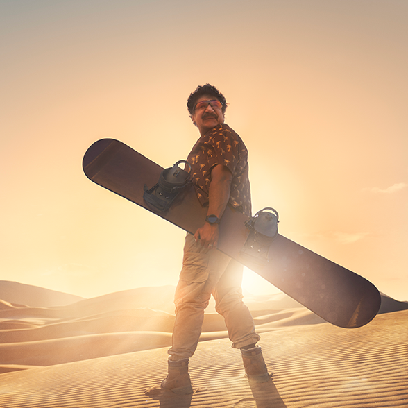 Karim håller i snowboard