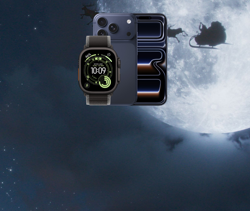 Mörkblå iPhone och Apple Watch mot natthimmel med måne och jultomtens släde som silhuett i bakgrunden.