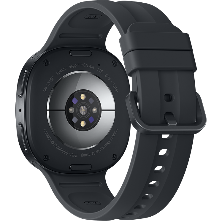 Baksida av Samsung Galaxy Watch i mörkgrå färg med silikonarmband och synliga hälsosensorer.