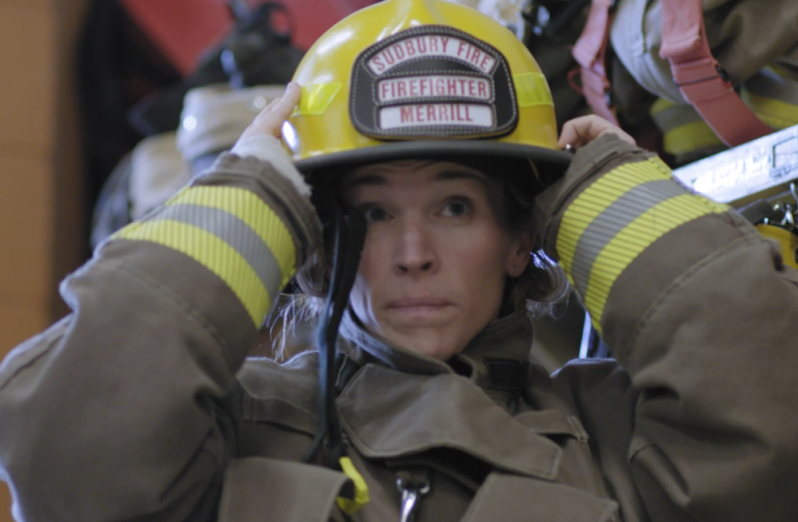 Woman in her firefighter uniform