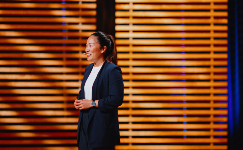 Woman speaking to an audience