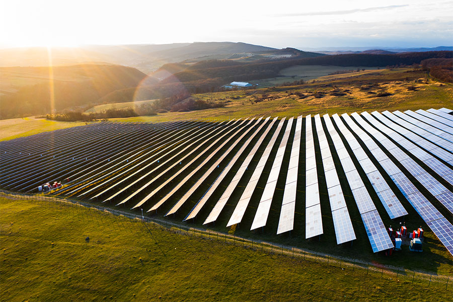 Solar panels in a sunny field