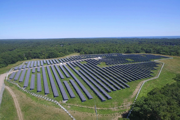 Solar panels in a field on a sunny day