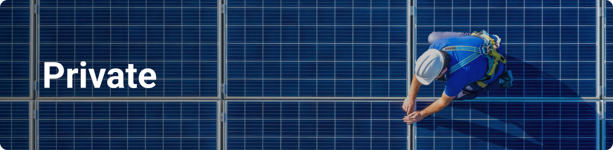 Private - a man standing on solar panels