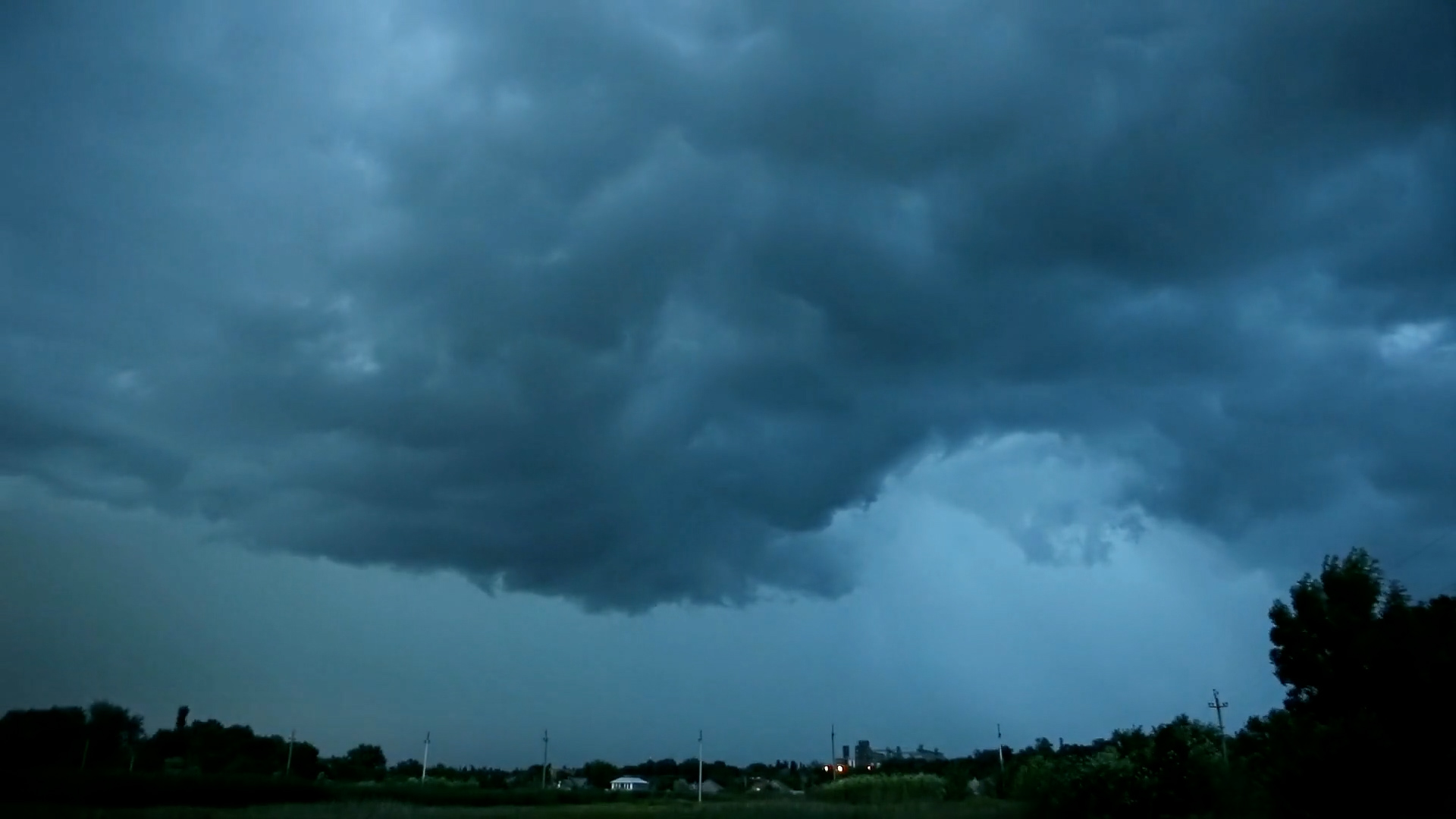 Storm clouds gather in the sky.