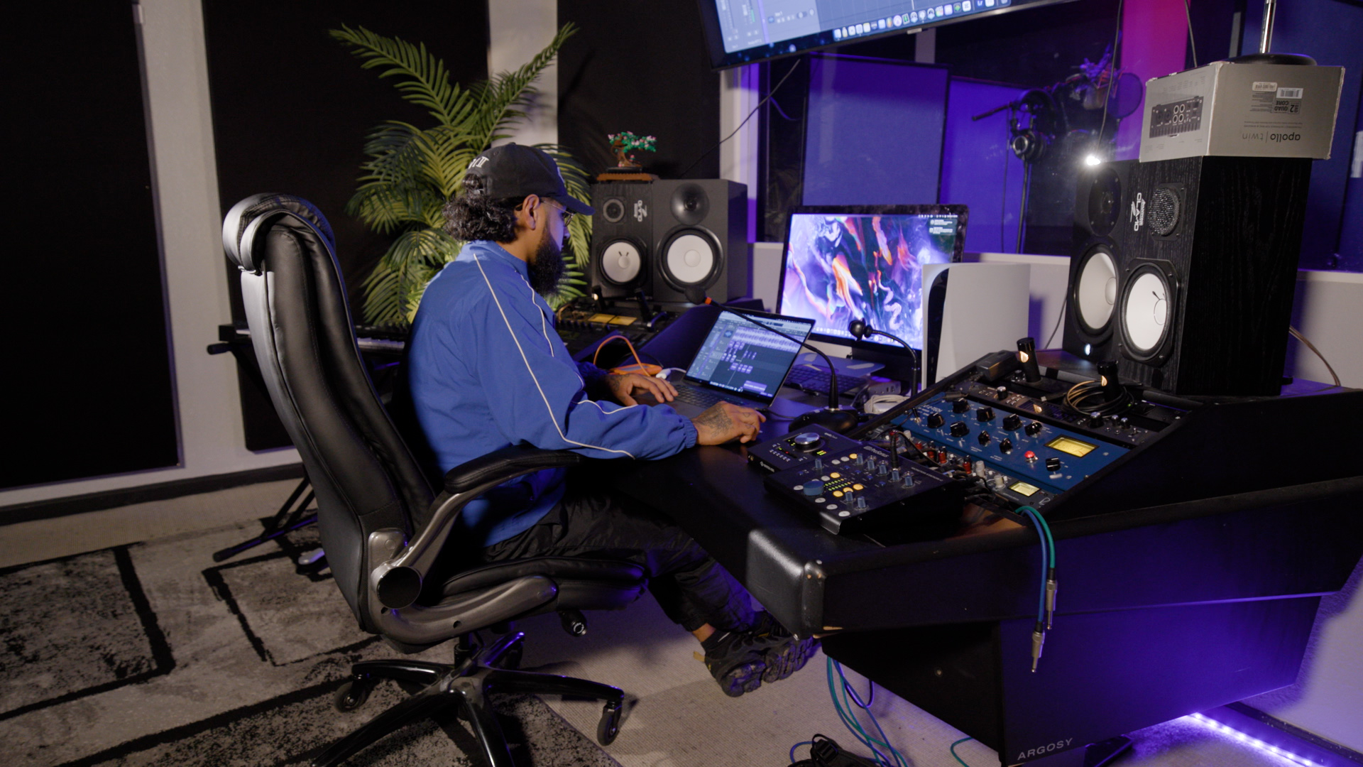 Music producer Christian Herrera aka the Mask works on a track. He helped create the theme music for the documentary ‘Navigating Dove Springs’.