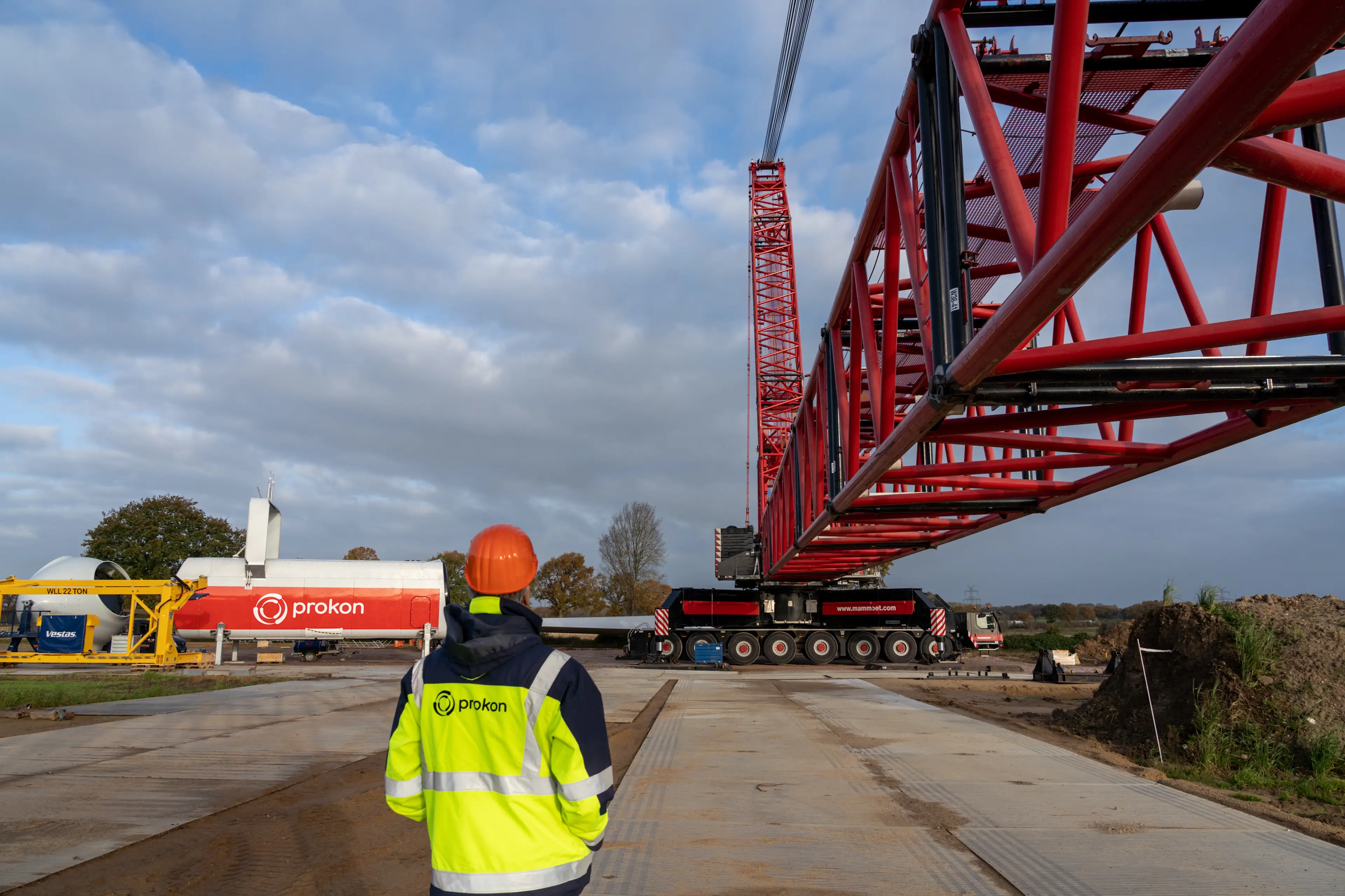 Employee of Prokon working on the construction of a wind turbine