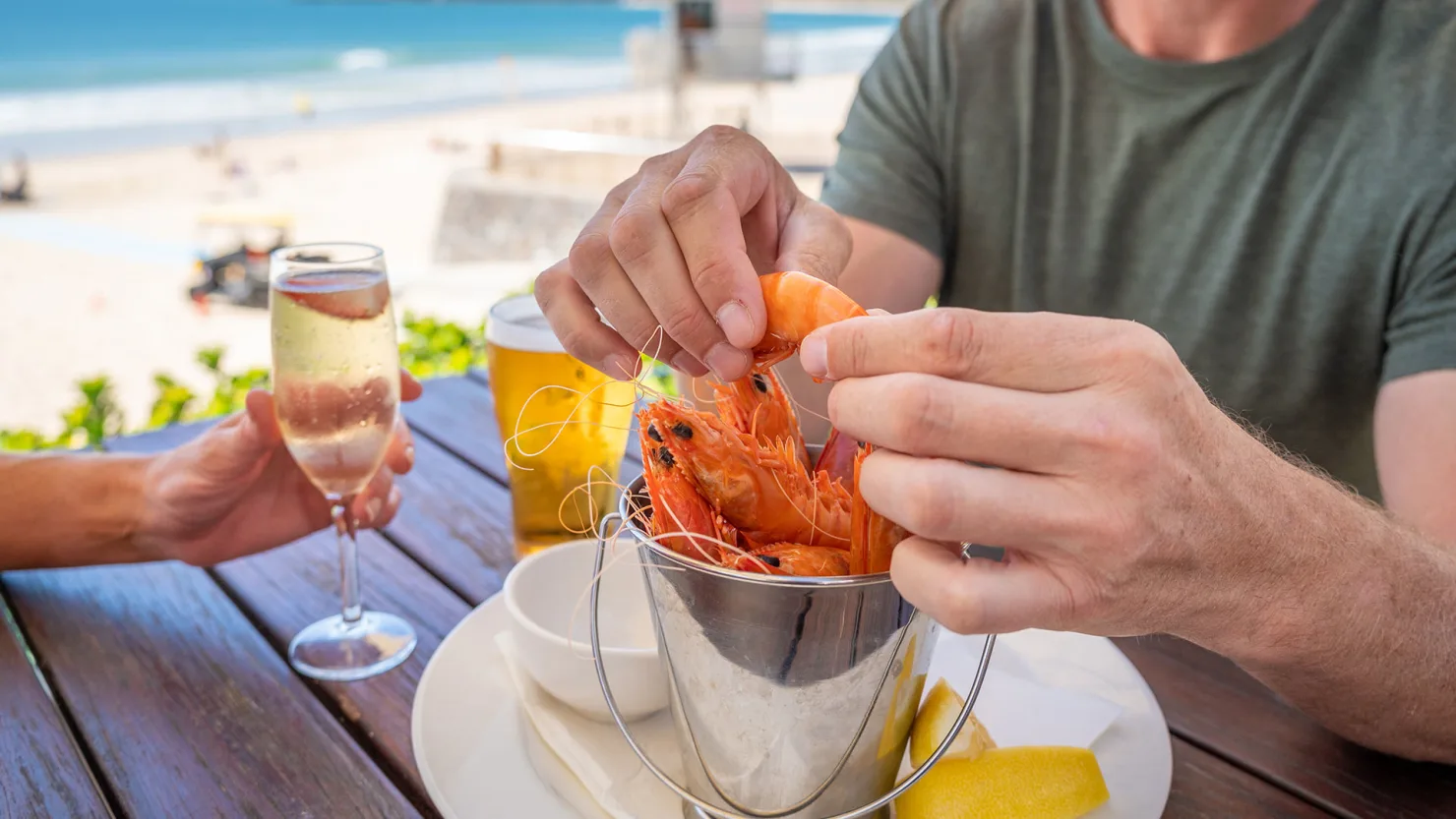 Eating Mooloolaba prawns at The Surf Club Mooloolaba, Sunshine Coast