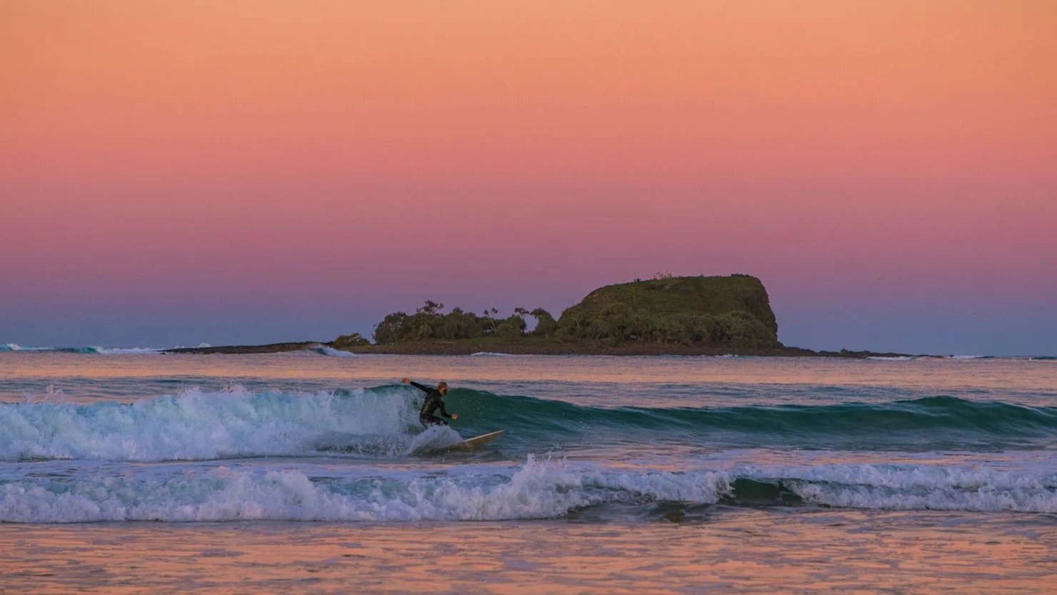 Surfing at Mudjimba Beach, Sunshine Coast