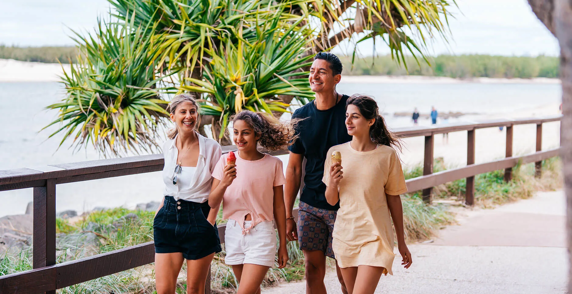 Enjoying ice cream and a walk down Bulcock Beach in Caloundra