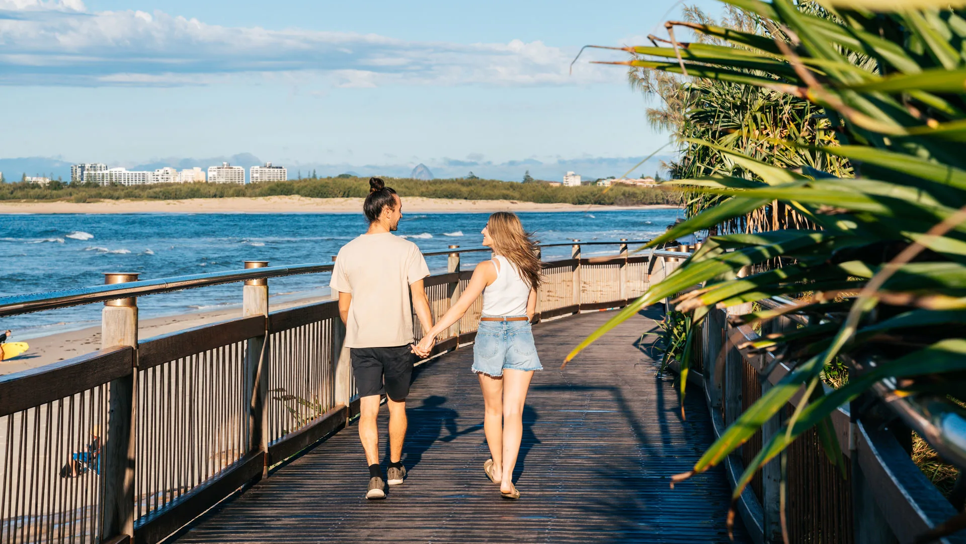 Cruise along crystal clear water on Caloundra's bike tracks