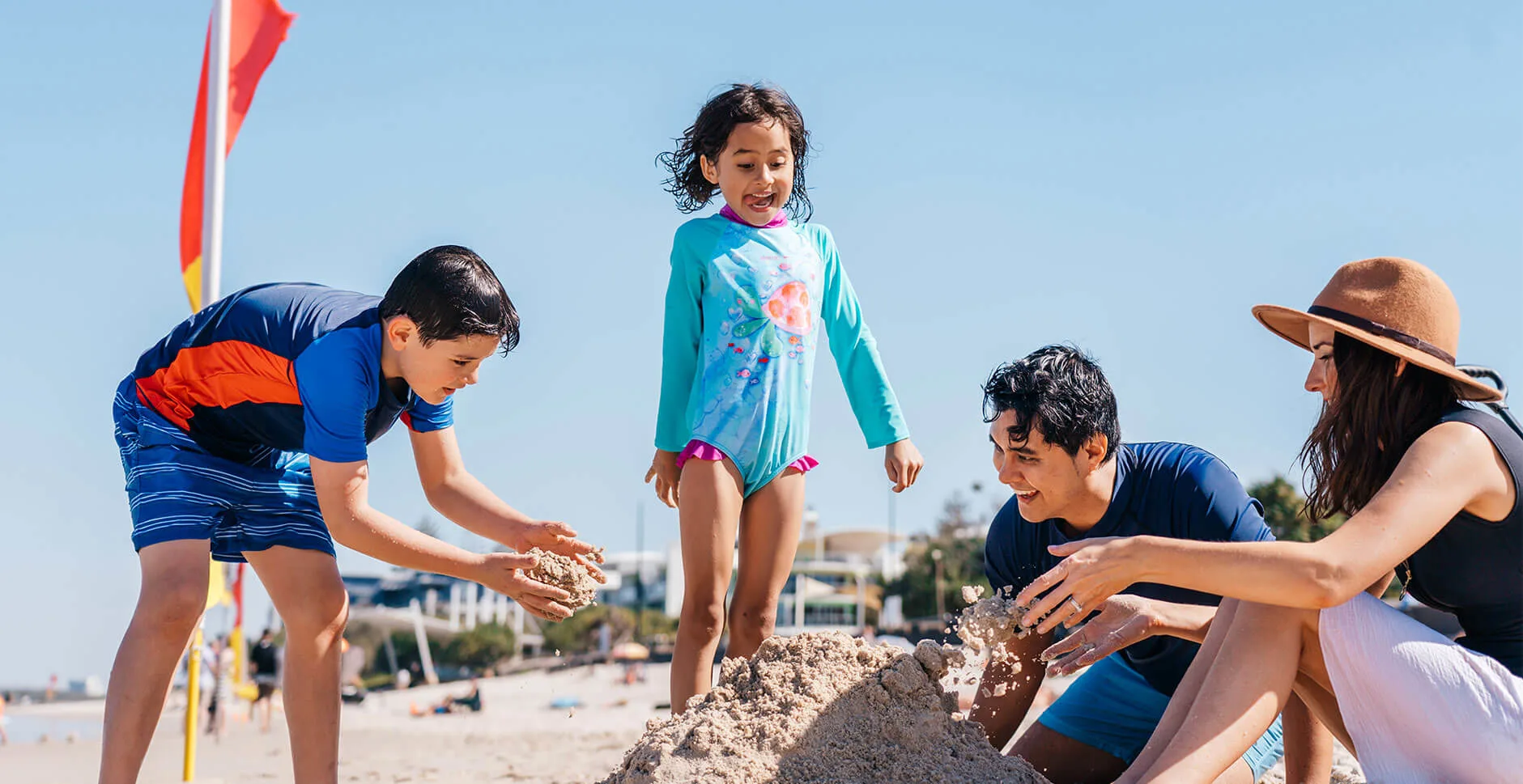 Family day at Kings Beach in Caloundra