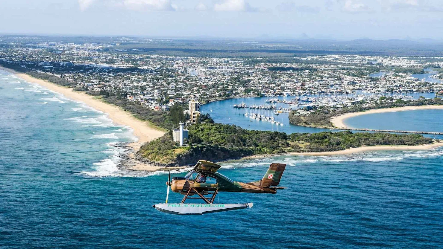 Flying over Point Cartwright with Paradise Seaplanes